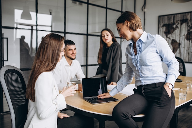 Group of people working out business plan in an office