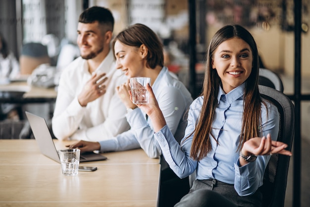 Group of people working out business plan in an office