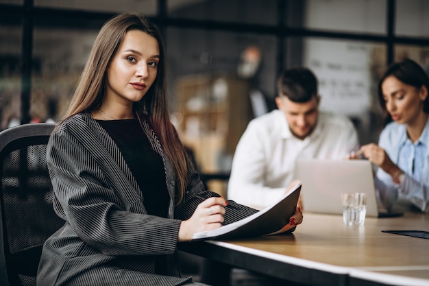 Group of people working out business plan in an office