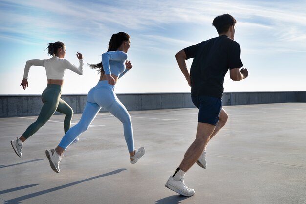 Group of people working out together outdoors