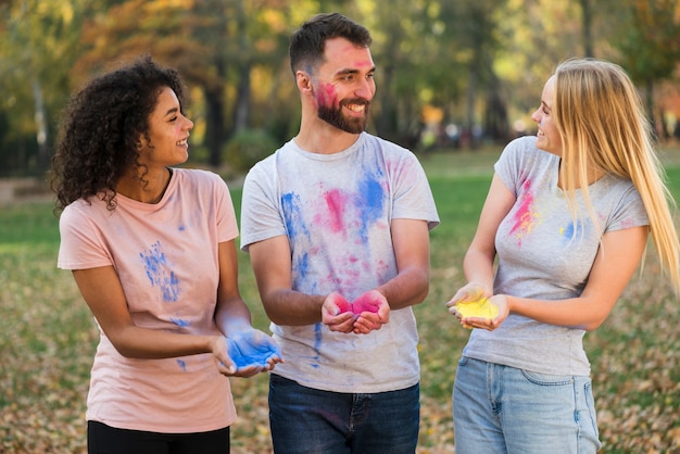 Group of posing friends looking at each other