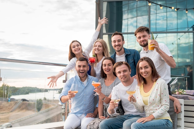  group posing at a party on the terrace