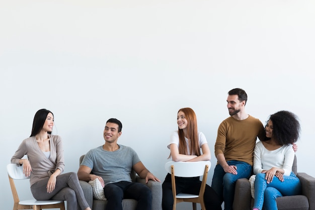 Group of positive young people chilling