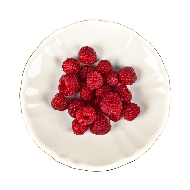 Group of raspberries over isolated white background