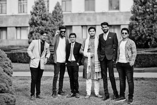 Group of six south asian indian mans in traditional casual and business wear
