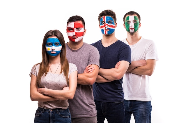 Group of supporter of Argentina, Croatia, Iceland, Nigeria national teams fans with painted face isolated on white background