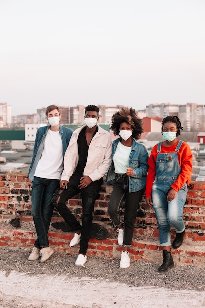 Group of teenagers posing outdoors