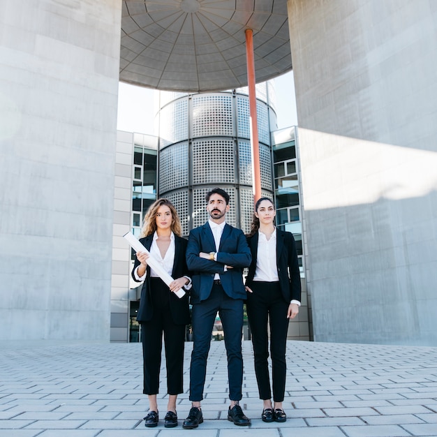 Free photo group of three business people