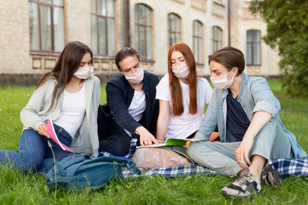 Group of university students hanging out together