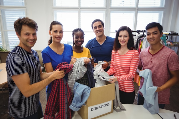 Group of volunteers checking clothes