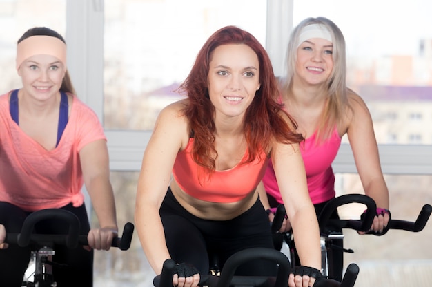 Group of women cycling in class