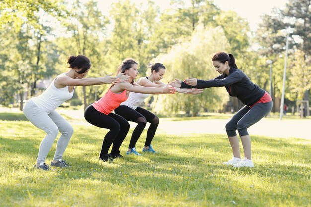 group of women doing sports outdoor