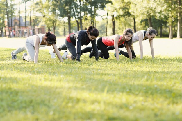 group of women doing sports outdoor