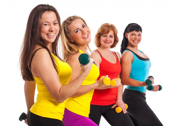 Group of women exercising over background