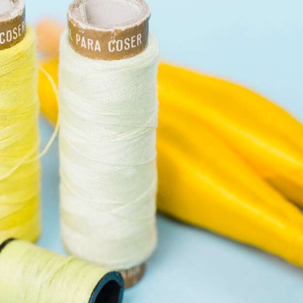 group of yellow thread reals