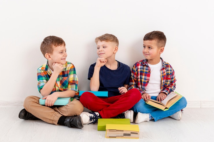 Free Photo group of young boys at book day event