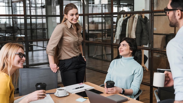 Group of young businesspeople during a meeting indoors