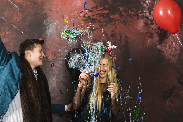 Group of young friends celebrating new year