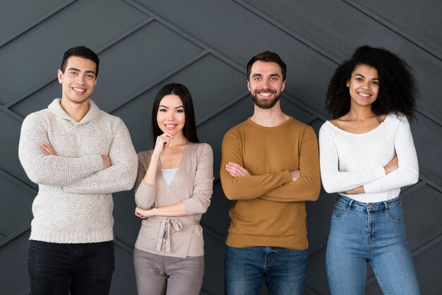 Group of young people posing together