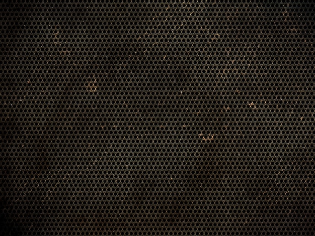 Free photo grunge perforated metallic texture background