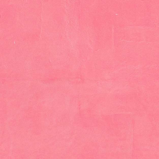 Grunge pink surface. Rough background textured .