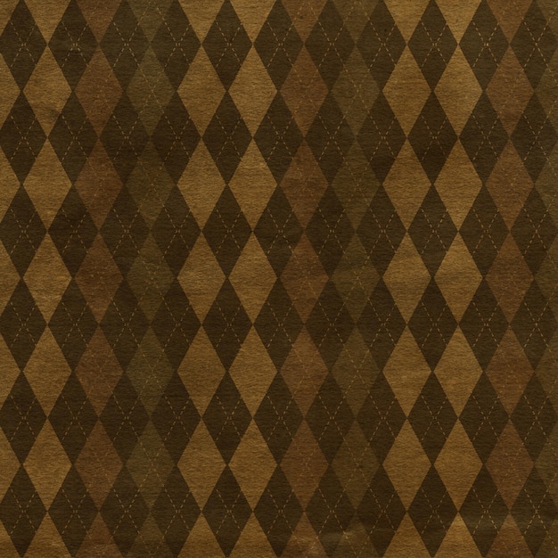 Free photo grunge style argyle pattern background with stains and creases