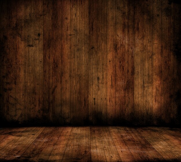 Grunge style image of a room interior with wooden floors and walls