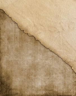 Grunge style paper texture background with stains and creases