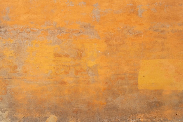 Free photo grunge yellow wall texture