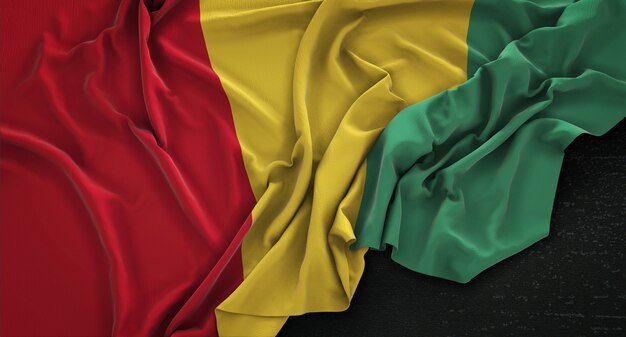 Guinea Flag Wrinkled On Dark Background 3D Render