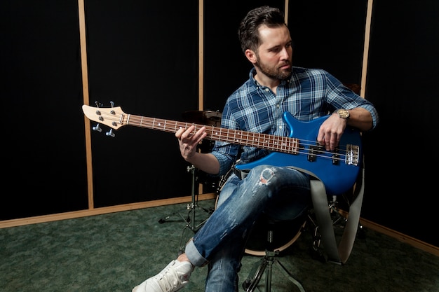 Guitarist on chair