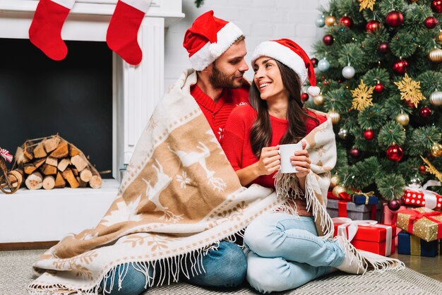 Guy hugging lady with cup