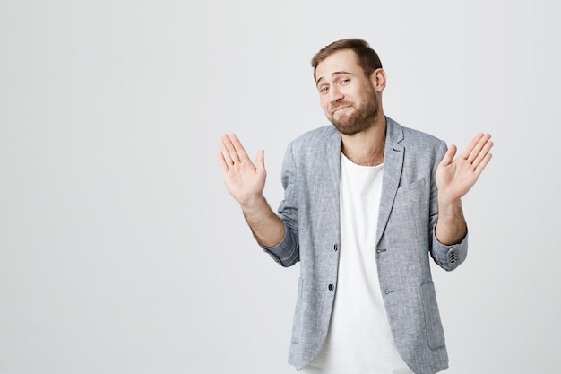 Guy raising hands up in surrender, agree with terms