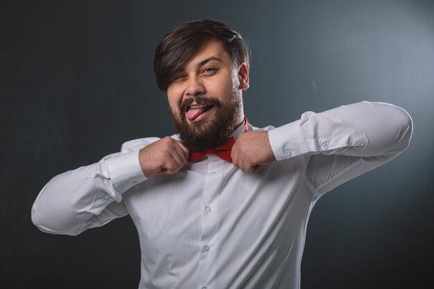 Guy in a white shirt with red tie bow