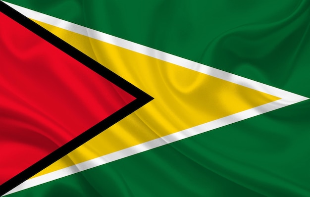 Guyana country flag on wavy silk fabric background panorama - illustration