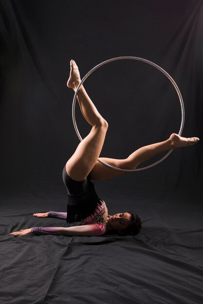 Gymnast using the hoop