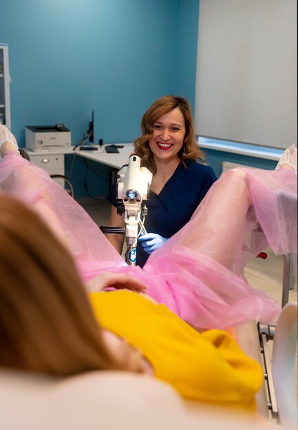 gynecologist performing consultation on patient