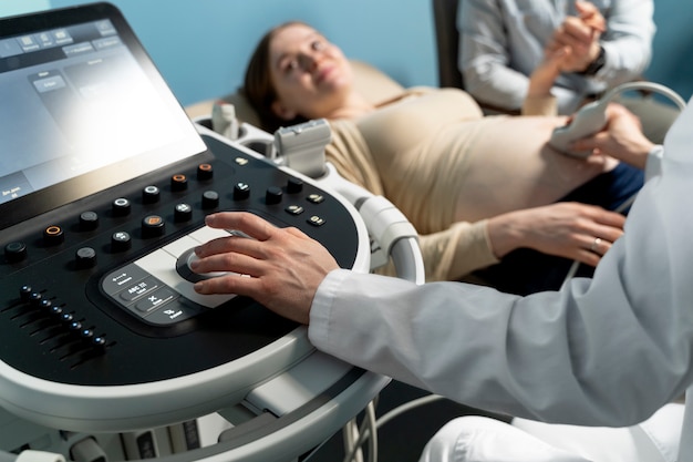 Gynecologist performing ultrasound consultation