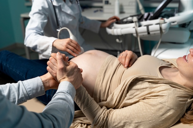 Gynecologist performing ultrasound consultation