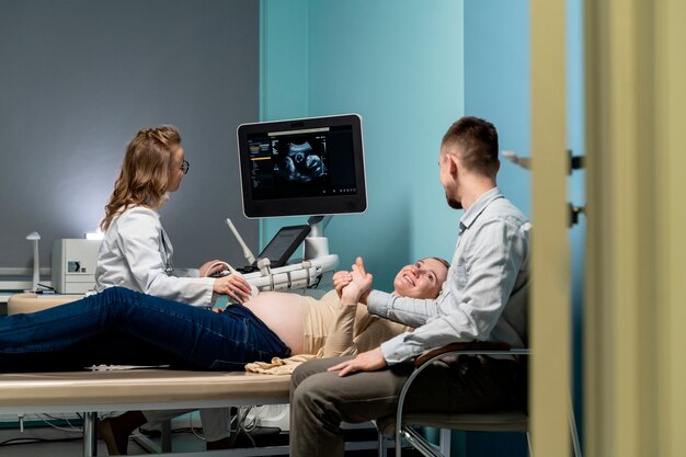 Gynecologist performing ultrasound consultation