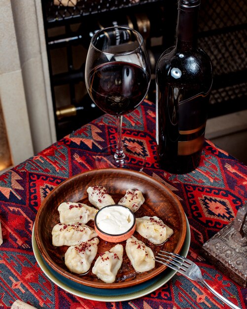 Gyurza khingal with dried barbery and red wine