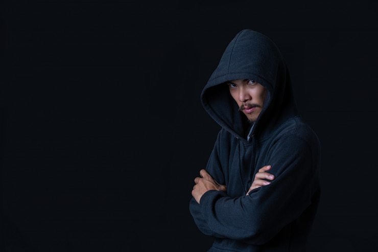 Free Photo hacker standing in the dark