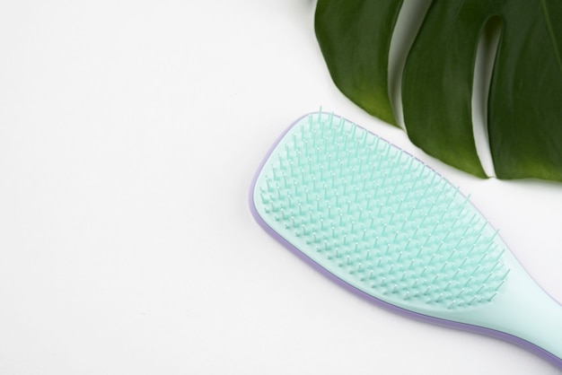 hair brush with copy space flat lay
