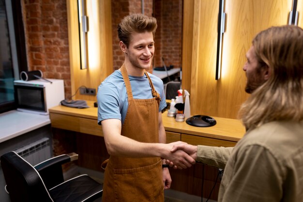 Hairdresser grooming their client