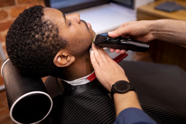 Hairdresser grooming their client