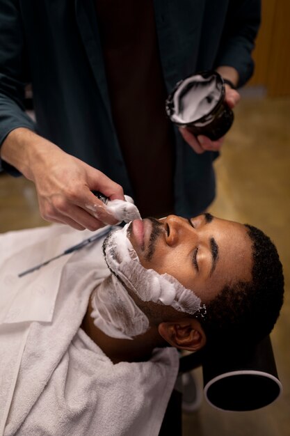 Hairdresser grooming their client