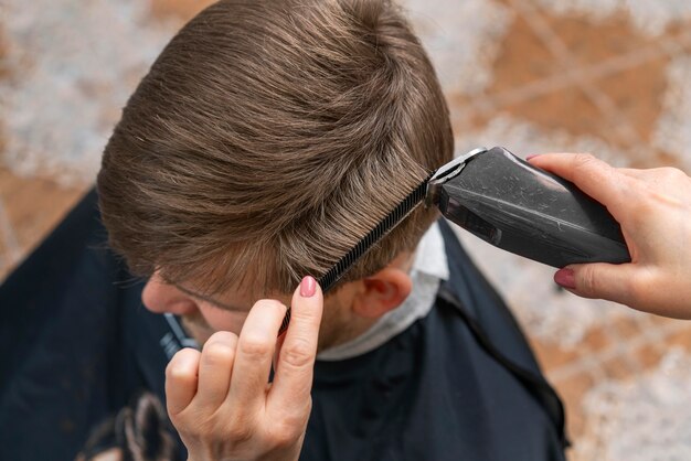 Hairdresser taking care of a client's hair