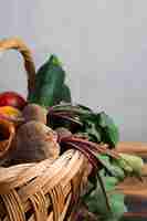 Free photo half of a basket with radishes