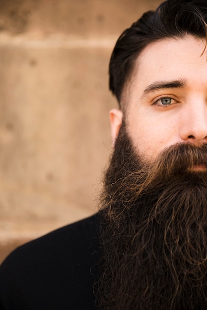 Half face portrait of a bearded man