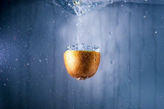 Half kiwi in water